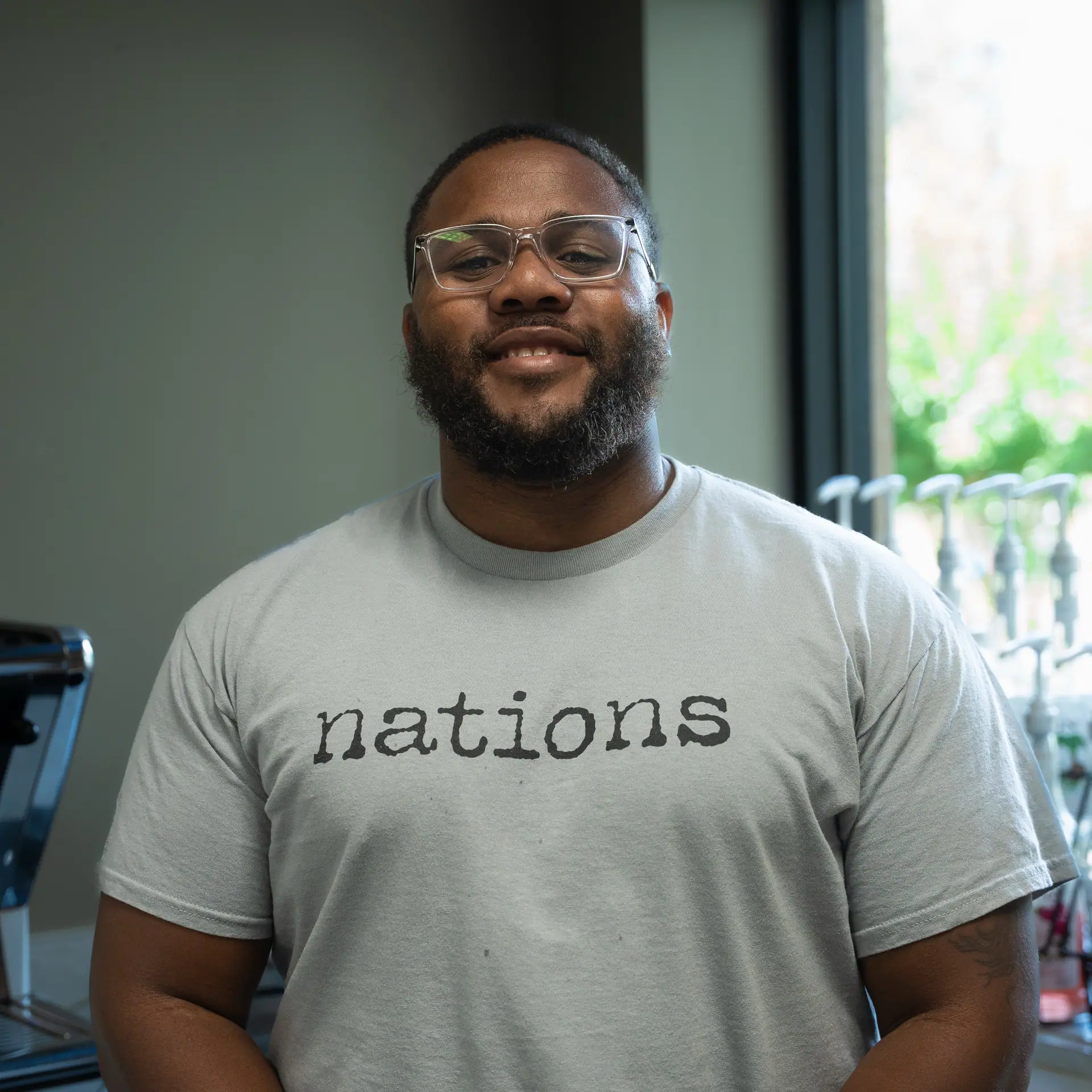 A smiling member of the welcome team