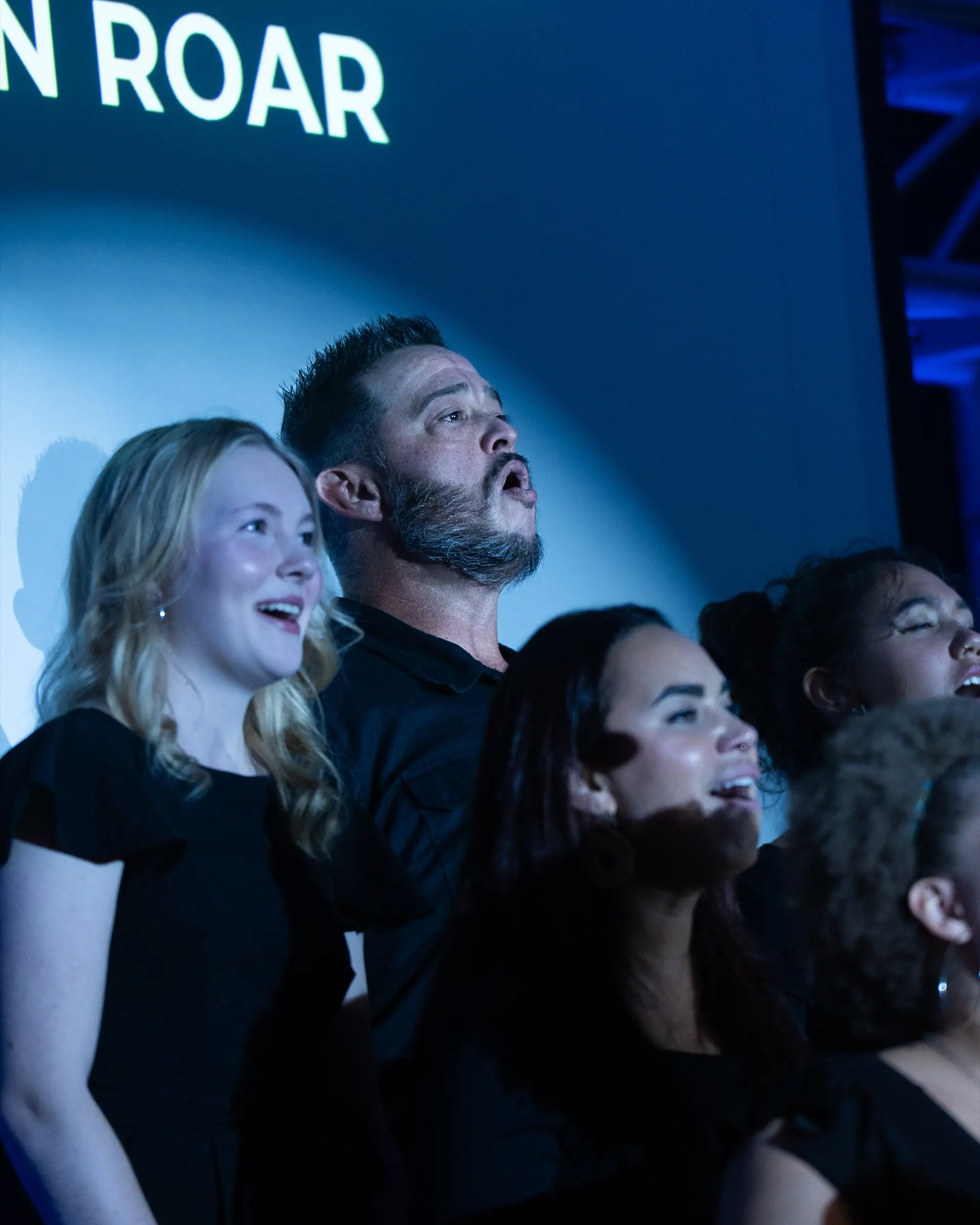 Young adults worshiping together